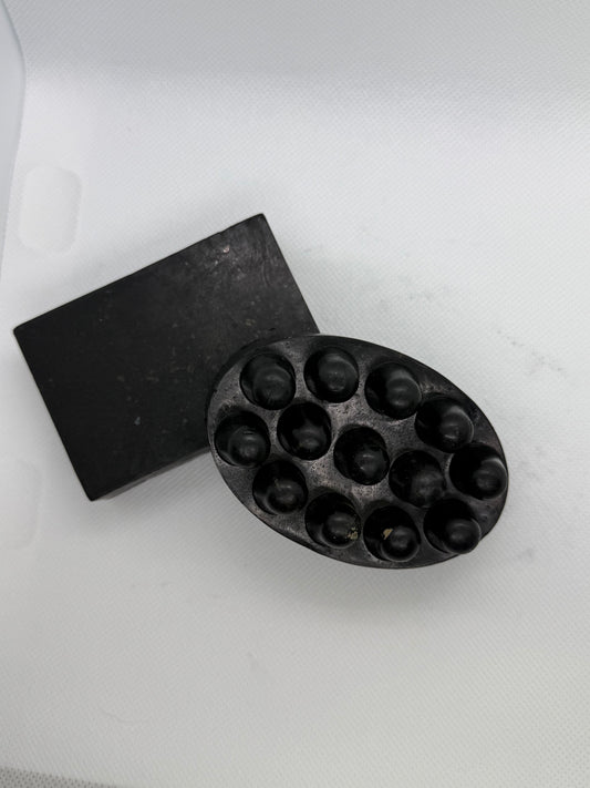 Exfoliating soap bar with a sandalwood scent