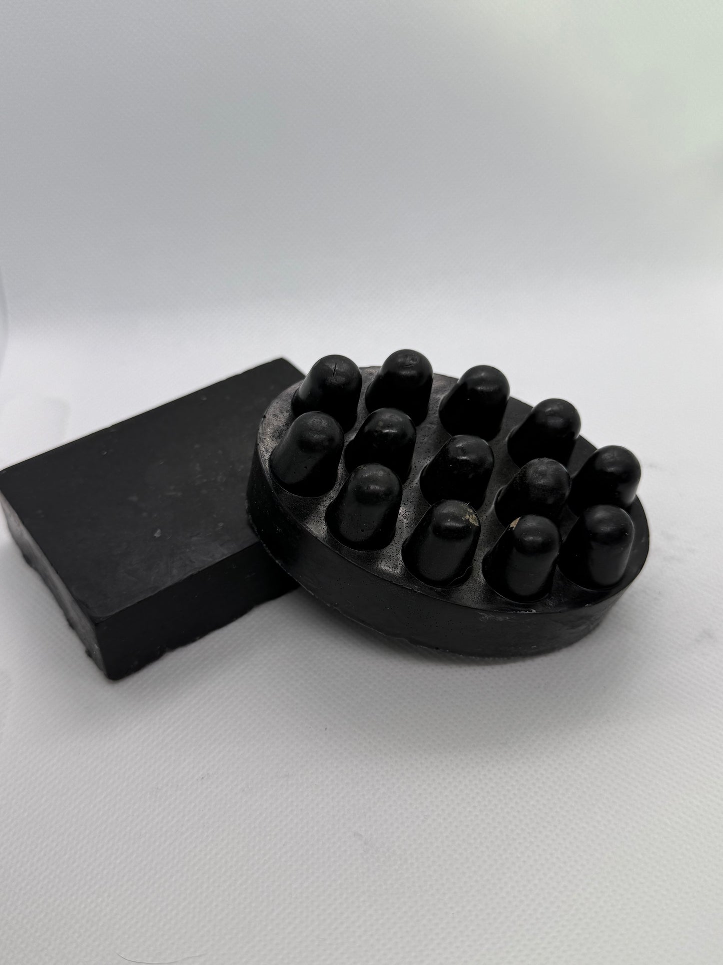 Exfoliating soap bar with a sandalwood scent