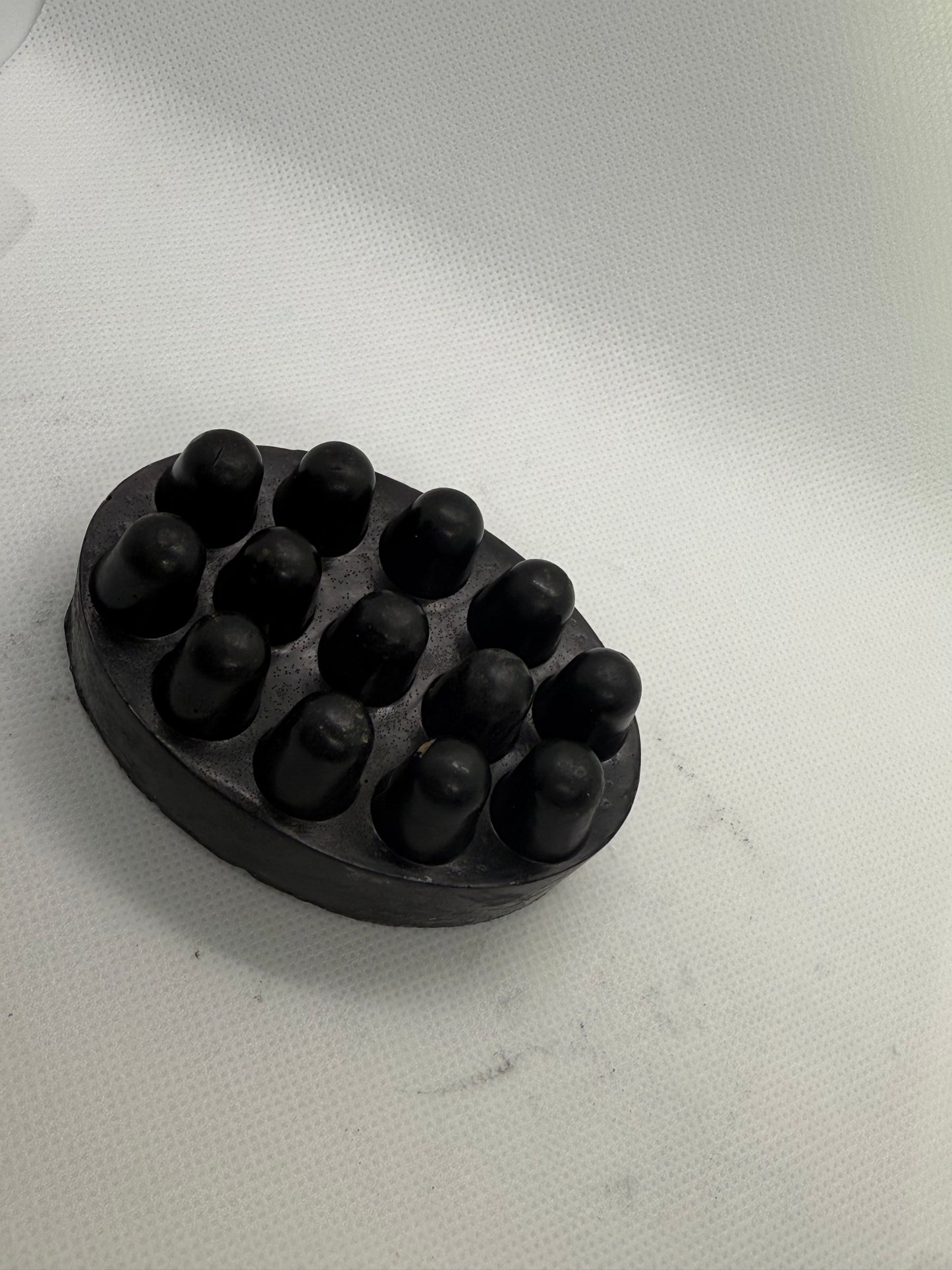 Exfoliating soap bar with a sandalwood scent