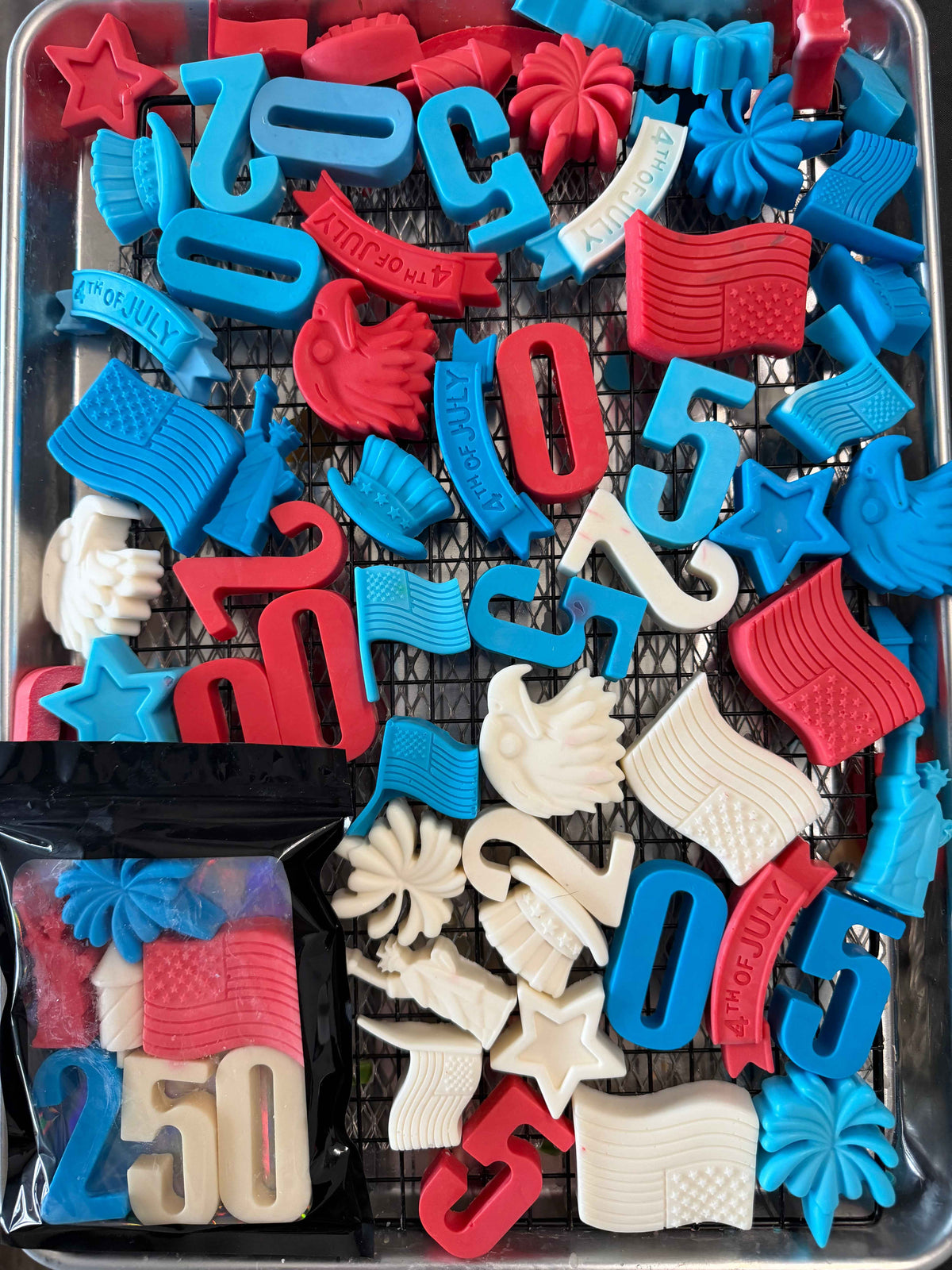 Seven patriotic mini soaps in red, white, and blue for America's 250th