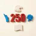 Seven patriotic mini soaps in red, white, and blue for America's 250th