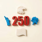Seven patriotic mini soaps in red, white, and blue for America's 250th