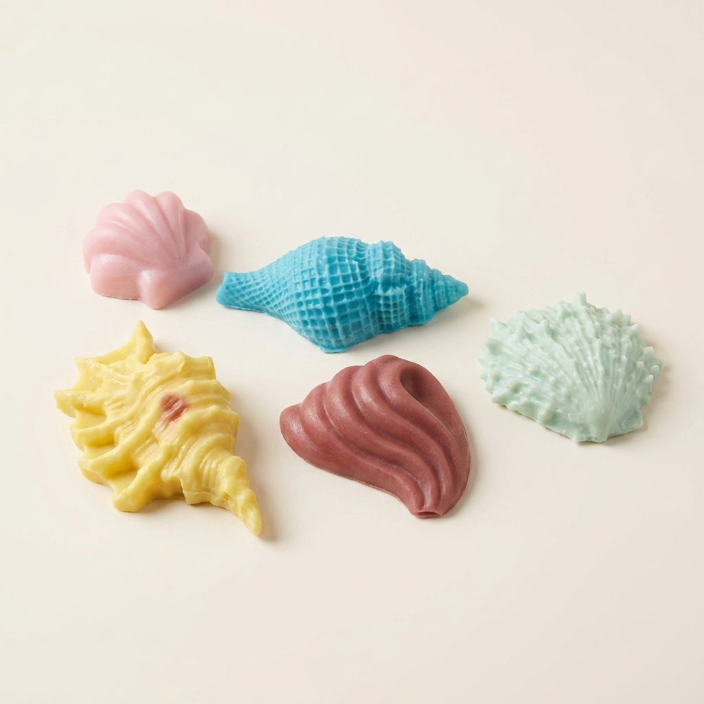 Five decorative mini shell soaps for guest baths and gifting